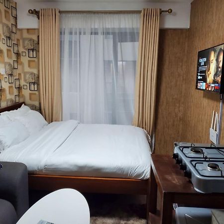 Апартаменты Lovely & Cozy Compact Studio Near Airport With Rooftop View Найроби Экстерьер фото