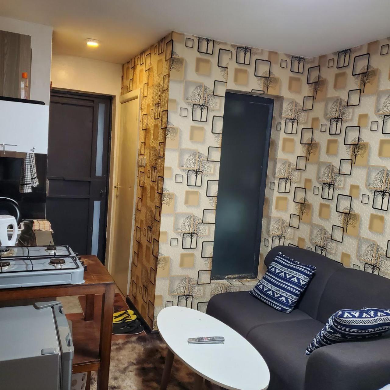 Апартаменты Lovely & Cozy Compact Studio Near Airport With Rooftop View Найроби Экстерьер фото