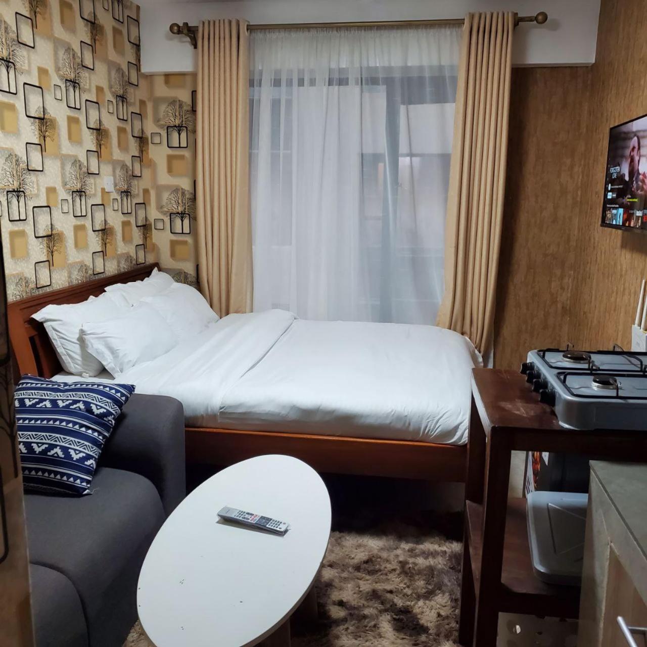 Апартаменты Lovely & Cozy Compact Studio Near Airport With Rooftop View Найроби Экстерьер фото