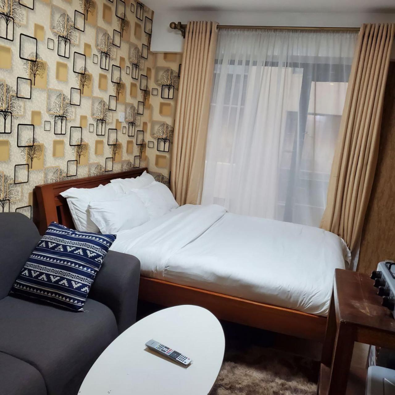 Апартаменты Lovely & Cozy Compact Studio Near Airport With Rooftop View Найроби Экстерьер фото