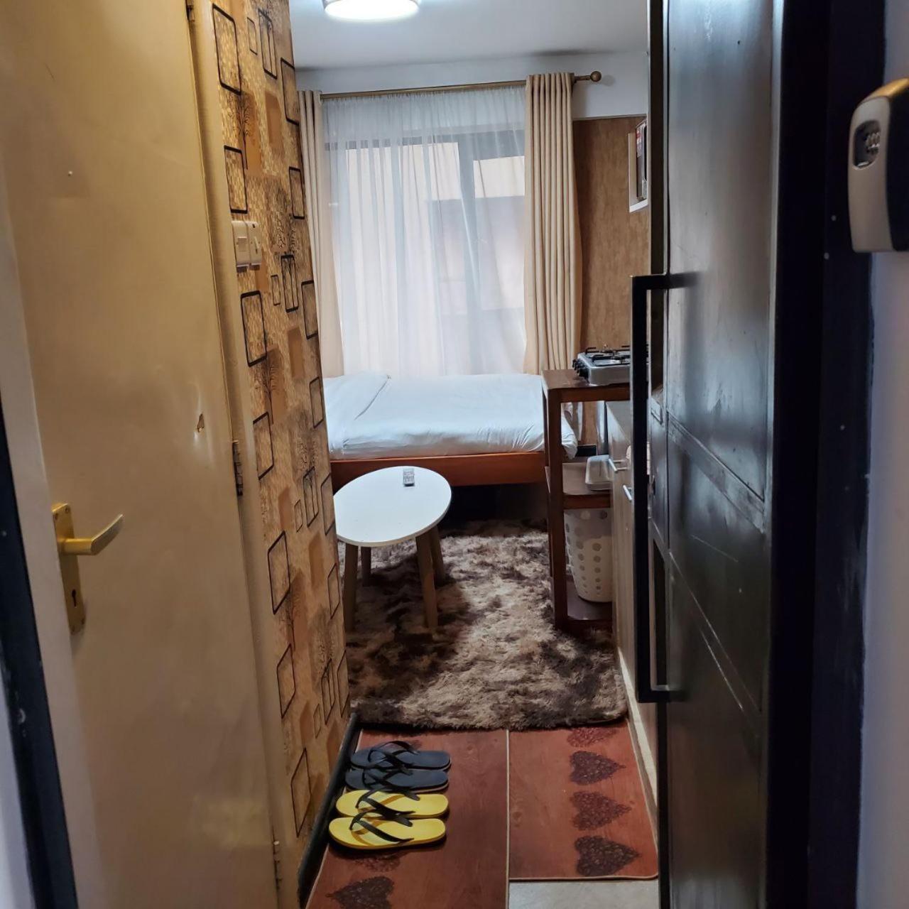 Апартаменты Lovely & Cozy Compact Studio Near Airport With Rooftop View Найроби Экстерьер фото